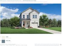 Charming two-story home with white siding, front porch, and well-manicured lawn at 2408 Hillbourne Loop, North Myrtle Beach, SC 29582