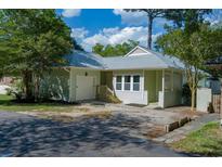 Charming single-story home featuring a one-car garage, lush landscaping, and a welcoming front entrance at 814 Night Heron Ln., Myrtle Beach, SC 29572