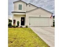 Charming home featuring a two-car garage, and a manicured lawn, displaying classic suburban appeal at 8211 Forest Edge Dr., Myrtle Beach, SC 29579