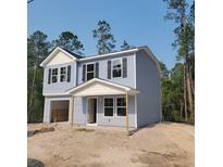 New two-story home with blue siding, black shutters, and an attached one-car garage at 5362 Hampton Rd., Conway, SC 29527