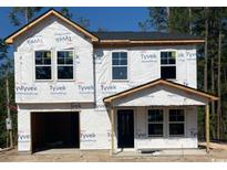 New two-story home under construction featuring a two-car garage and classic window design at 5362 Hampton Rd., Conway, SC 29527