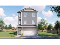 Charming three-story home with a two-car garage and gray siding at 1105 Salt Windy Way, North Myrtle Beach, SC 29582
