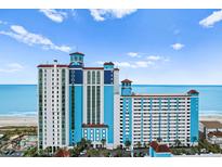 Stunning exterior of an oceanfront high rise building with a view of the beach and the ocean at 3000 N Ocean Blvd. # 333, Myrtle Beach, SC 29577