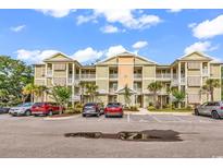 Beautiful condominium complex with private balconies, landscaping, and convenient parking at 35 Delray Dr. # 3A, Murrells Inlet, SC 29576