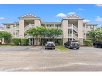 Inviting condo complex featuring classic architectural design and easily accessible parking at 6016 Dick Pond Rd. # 109, Myrtle Beach, SC 29588