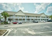 Inviting condo exterior features balconies and ample parking, ideal for easy living at 109 Butkus Dr. # 2-1, Myrtle Beach, SC 29588