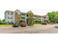 Well-maintained condo building with manicured landscaping and ample parking spaces at 3774 Hitchcock Way # 836, Myrtle Beach, SC 29572