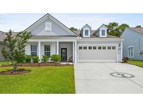 Charming single-Gathering home with a well-manicured lawn and a spacious two-car garage in a well-kept neighborhood at 4555 Weekly Dr, Myrtle Beach, SC 29579