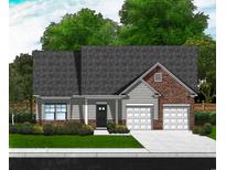 Charming home with gray siding, brick accents, attached two-car garage, and well-maintained landscaping at 1045 Jase Dr., Longs, SC 29568