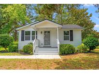 Charming single-story home with a well-manicured lawn and inviting entrance at 1004 Georgetown St., Marion, SC 29571