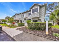 Charming two-story townhome with manicured landscaping and visitor parking in a coastal community at 97 Shadow Moss Pl. # 97, North Myrtle Beach, SC 29582