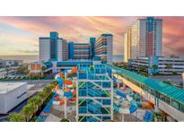 A view of Landmark Resort's onsite waterpark and nearby buildings at 1501 Ocean Blvd. S # 242, Myrtle Beach, SC 29577