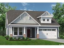 Charming single-Gathering home featuring a two-car garage, covered porch, and well-maintained landscaping at 1563 Breakwater Dr., Little River, SC 29566