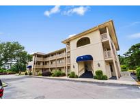 Well-maintained condominium building with classic architecture and a welcoming entrance at 4101 Pinehurst Circle # Aa-3, Little River, SC 29566