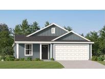 Charming single-Gathering home featuring a 2-car garage and well-maintained front lawn at 6344 Swainson Street Sw, Ocean Isle Beach, NC 28469