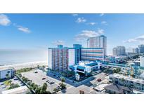 Beautiful aerial view of the beachfront resort with pools, parking, and access to the ocean at 1501 S Ocean Blvd. # 351, Myrtle Beach, SC 29577