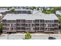 Three-story condo with private balconies, offering stunning views and convenient parking at 207 N Ocean Blvd. # 342, North Myrtle Beach, SC 29582