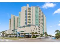 Stunning full exterior view of the Avista Resort in North Myrtle Beach on a bright sunny day with a blue sky at 300 N Ocean Blvd. # 122, North Myrtle Beach, SC 29582