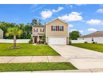 Charming two-story home featuring a well-manicured lawn and a classic neutral color palette at 408 Carmello Circle, Conway, SC 29526