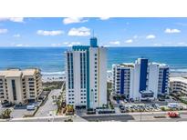 High-rise condo building with ocean views, offering a blend of modern design and beachside living at 2301 S Ocean Blvd. # 1405, North Myrtle Beach, SC 29582