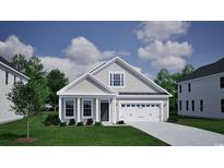 Charming home featuring light gray siding, a two-car garage, and well-maintained landscaping at 1103 Laconic Dr., Myrtle Beach, SC 29588