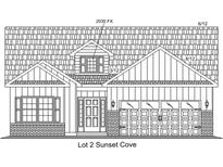 Charming craftsman-style home showcasing a symmetrical front facade, detailed windows, and a welcoming front door at 68 Henderson Way, Pawleys Island, SC 29585