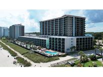 Spacious condominium complex with multiple pools, lush greenery, and beach access, perfect for a relaxing getaway at 2311 S Ocean Blvd. # 437, Myrtle Beach, SC 29577