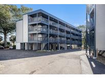 Multi-level condo building with parking underneath offers a beachy, coastal living feel at 1500 Cenith Dr. # B-403, North Myrtle Beach, SC 29582