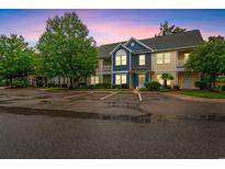 Beautiful multi-Gathering unit featuring covered entries, mature landscaping, and ample parking at dusk at 1654 Low Country Pl. # C, Myrtle Beach, SC 29577