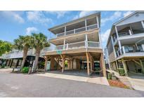 Beautiful three-story beach house with multiple decks and covered parking at 6001 - Mh 17A South Kings Hwy., Myrtle Beach, SC 29575