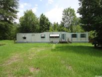Exterior of home featuring a large yard and ample space at 742 Se Hebron Dr., Conway, SC 29527