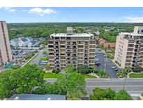 A beautiful aerial view of the condo building with lots of parking and a clear view of the ocean at 7601 N Ocean Blvd. # 7-C, Myrtle Beach, SC 29572