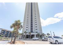 Stunning exterior of a high-rise building with palm trees and convenient parking, showcasing a desirable coastal lifestyle at 5905 South Kings Hwy. # 1414, Myrtle Beach, SC 29575