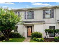 Charming townhome with a welcoming front door and manicured landscaping at 315 72Nd Ave. N # A, Myrtle Beach, SC 29572