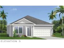 Charming single story home with a two car garage and decorative gable accents at 144 Joyce Dr, Longs, SC 29568