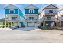 Charming elevated beach home with covered parking and spacious balconies, ideal for coastal living at 2310 Seaseeker Ln., Myrtle Beach, SC 29577
