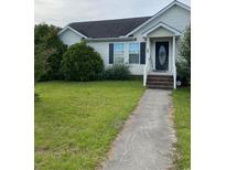 Charming single-story home with a well-maintained lawn and inviting entryway at 232 Weyburn St., Myrtle Beach, SC 29579
