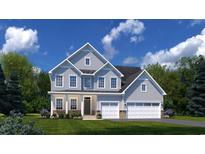 Charming two-story home featuring a two-car garage, stone accents, and a beautifully landscaped yard at 775 Indigo Bay Circle, Myrtle Beach, SC 29579