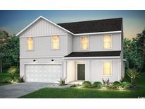 Charming two-story home with white siding, a dark roof, an attached garage, and manicured landscaping at 1047 Laconic Dr., Myrtle Beach, SC 29588