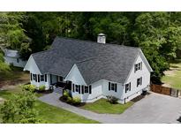 Aerial view of a well-maintained home with lush landscaping and a spacious yard at 160 Comanche Dr., Georgetown, SC 29440