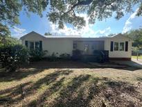 Charming single-story home with a metal roof, black shutters, and a welcoming front porch at 518 Nowell St., Georgetown, SC 29440