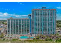 Oceanfront resort featuring multiple pools, beach access, and high-rise condo buildings with balconies at 3000 N Ocean Blvd. # 1127, Myrtle Beach, SC 29577