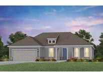 Charming single-story home with gray siding, a welcoming front porch, and a well-manicured lawn at 417 Nautical Way, Myrtle Beach, SC 29588