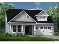 Charming single-story home featuring a covered porch with stone accents and an attached two-car garage at 1188 Halter Pl., Calabash, NC 28467