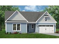 Charming single-story home featuring light blue siding, a gray roof, and a two-car garage on a lush green lawn at 1238 Halter Pl., Calabash, NC 28467