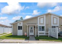 Charming townhouse with tidy landscaping, neutral tones, and inviting curb appeal at 1311 Turkey Ridge Rd. # A, Surfside Beach, SC 29575