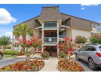 Charming condo building featuring a neatly landscaped entrance, three stories and well-maintained exteriors at 5601 N Ocean Blvd. # B-314, Myrtle Beach, SC 29577
