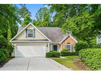 Charming single Gathering home with attached two car garage and manicured landscaping at 5008 Hayes Bay Ct., Murrells Inlet, SC 29576