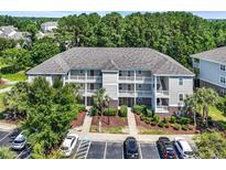 A lovely multi-Gathering unit with multiple levels, balconies, a parking lot, and landscaping at 6253 Catalina Dr. # 1824, North Myrtle Beach, SC 29582