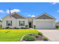 Charming one-story home featuring a well-manicured lawn and an attached two-car garage at 1108 Donald St., Conway, SC 29527